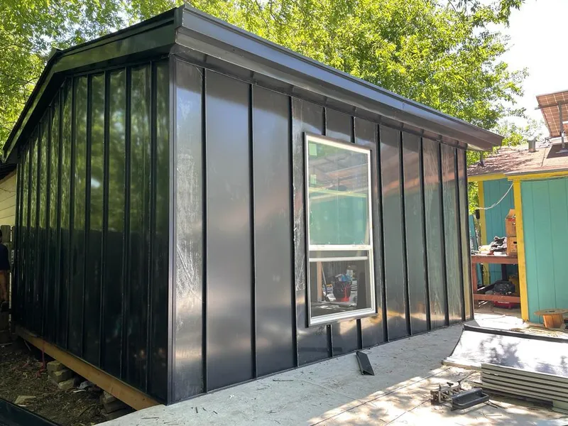 Black standing seam metal wall panels for Roof Inspection in Cedarhurst